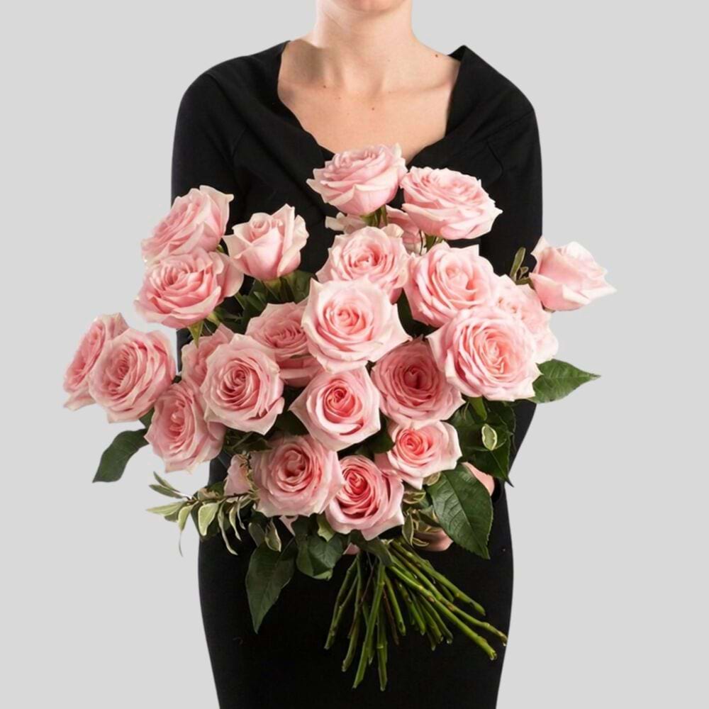 24-stem Pink O`Hara rose bouquet with soft blush pink garden roses wrapped in white paper and finished with a white ribbon.